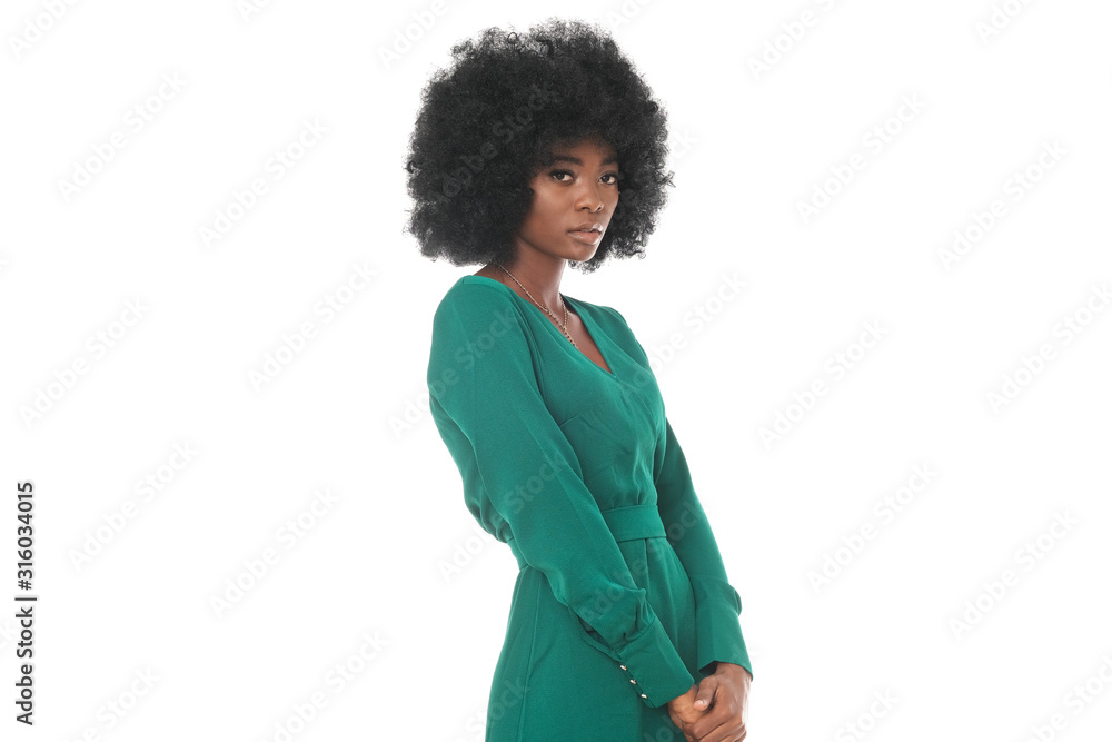 Elegant afro-americna model in bootle green dress looks very glamour. Elegant afro-americna model in bootle green dress looks very glamour.