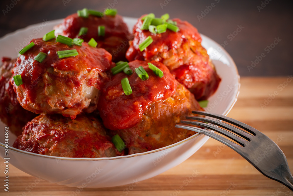 Meat balls with tomato sauce and herbs Meat balls with tomato sauce and herbs
