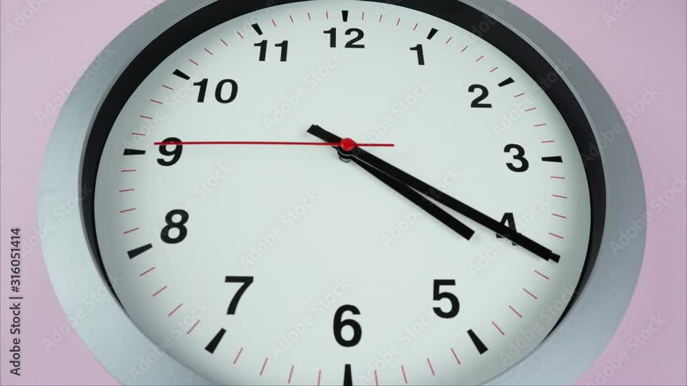 Four o'clock White wall clock face beginning of time 04.00 am or pm on Pink background, Time lapse 60 minutes moving fast. Four o'clock White wall clock face beginning of time 04.00 am or pm on Pink background, Time lapse 60 minutes moving fast.