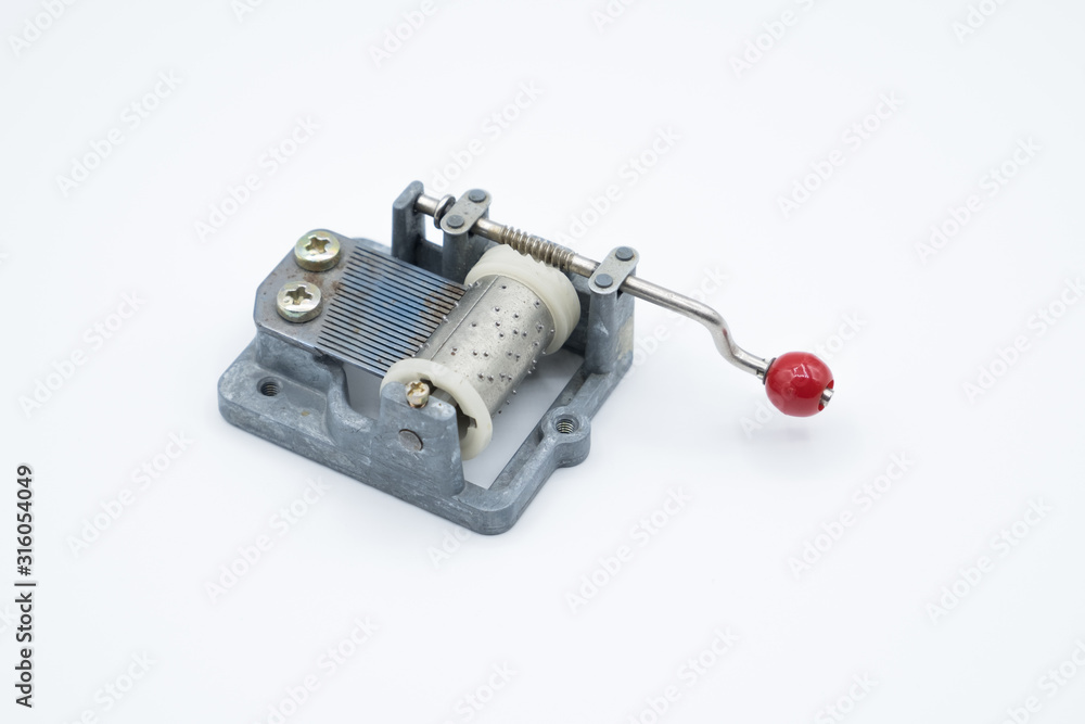 Old metal music box on white background Old metal music box on white background