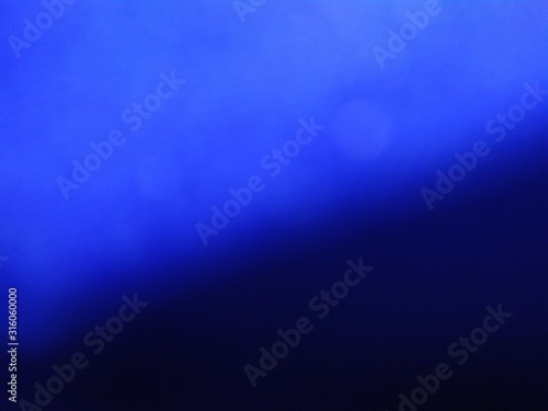 Light blue and dark background