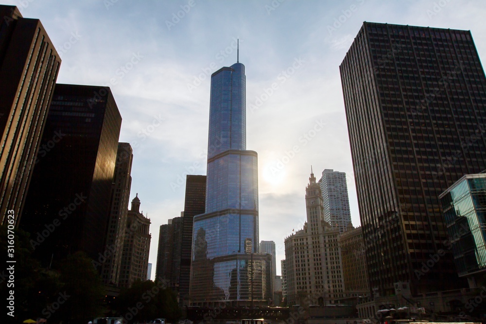 Obraz premium Skyscrapers in a financial district at sunset, looking up perspective, Chicago, USA
