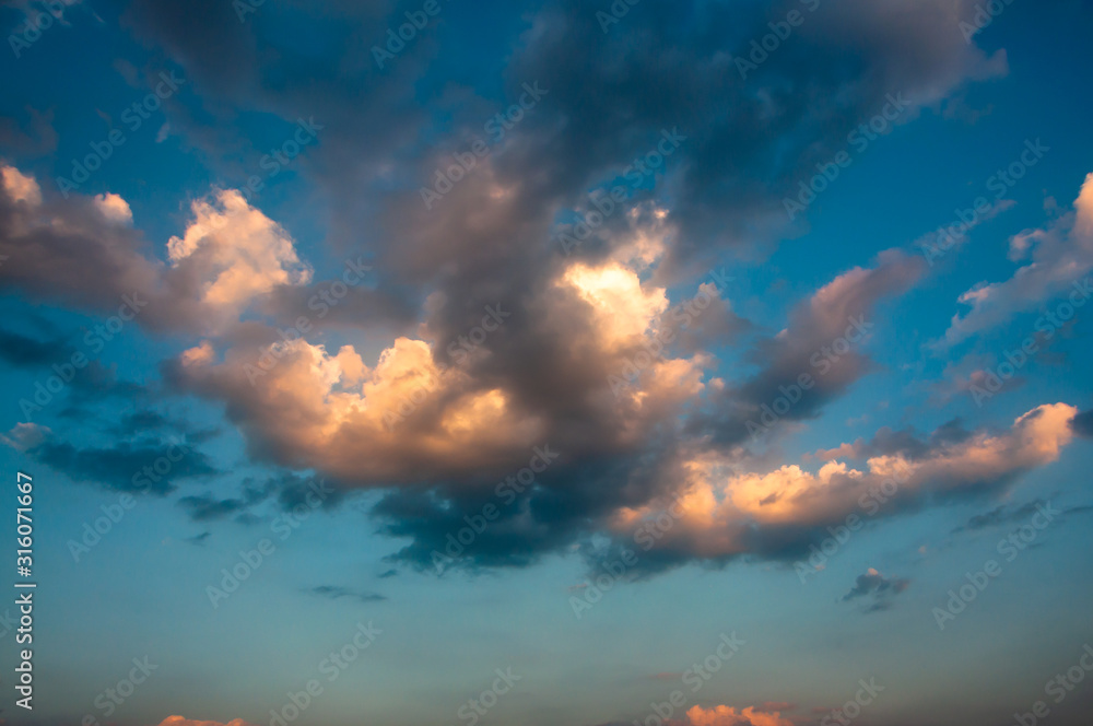 Dramatic blue sky with colorful clouds