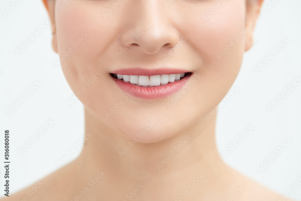Beautiful young woman with healthy teeth on white background Beautiful young woman with healthy teeth on white background