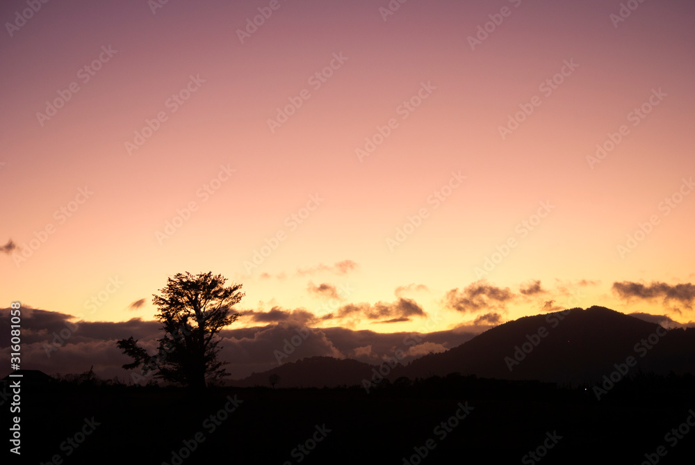 Dramatic sunset in rural area of ​​Guatemala, clear sky cold night of January 2020