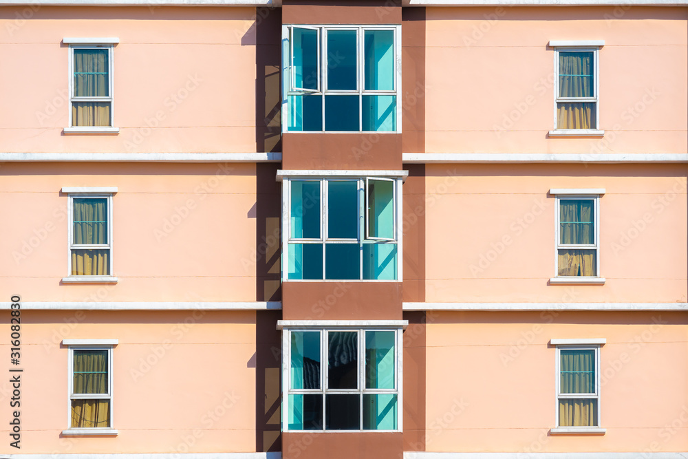 Fototapeta premium A view of apartment windows in Thailand. 