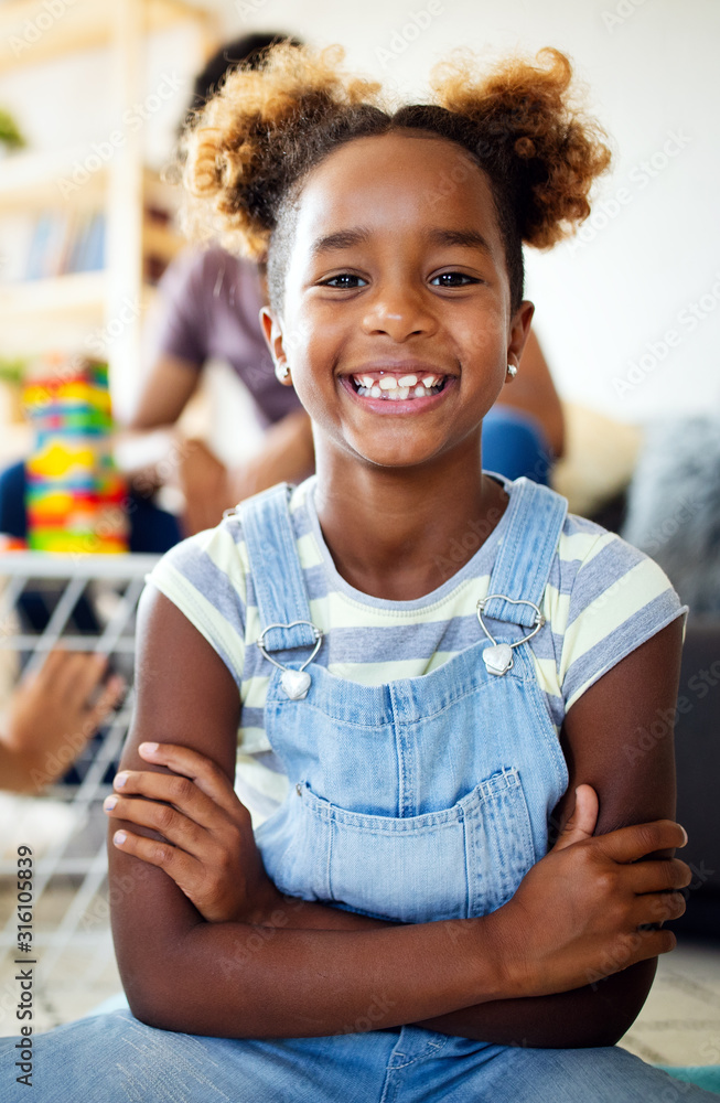 Beautiful portrait of a happy little african american girl smiling ...
