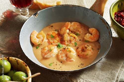 Close-up on scampi in cheese-cream sauce