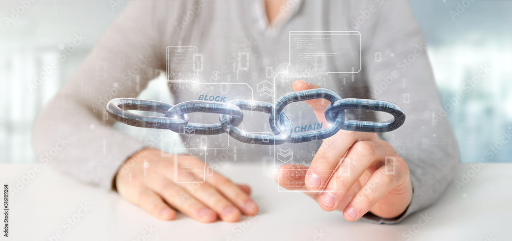 Fototapeta premium Businessman holding a virtual Blockcahin with data - 3d rendering