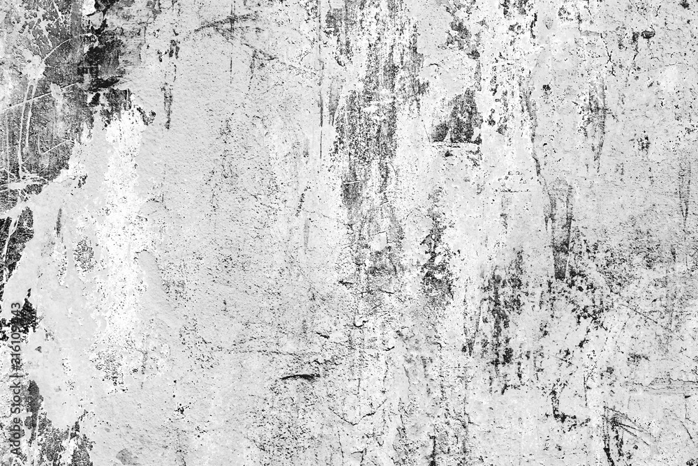 Fototapeta premium Texture of a concrete wall with cracks and scratches which can be used as a background