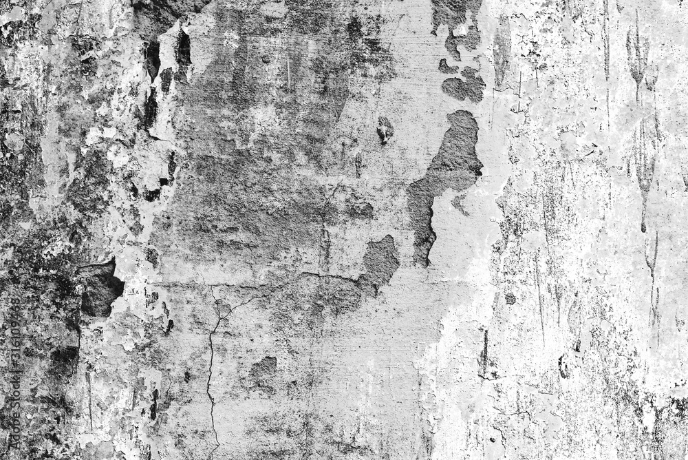 Fototapeta premium Texture of a concrete wall with cracks and scratches which can be used as a background