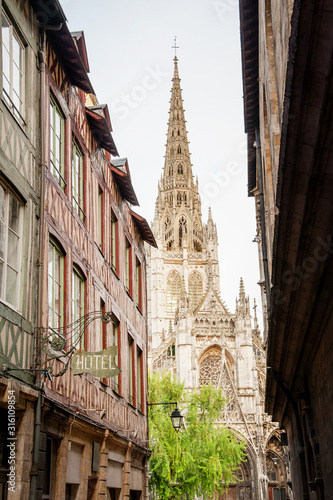 Main shopping street Rue du Gros Horloge (Great Clock) and Rouen Notre Dame cathedral, Rouen, France photo