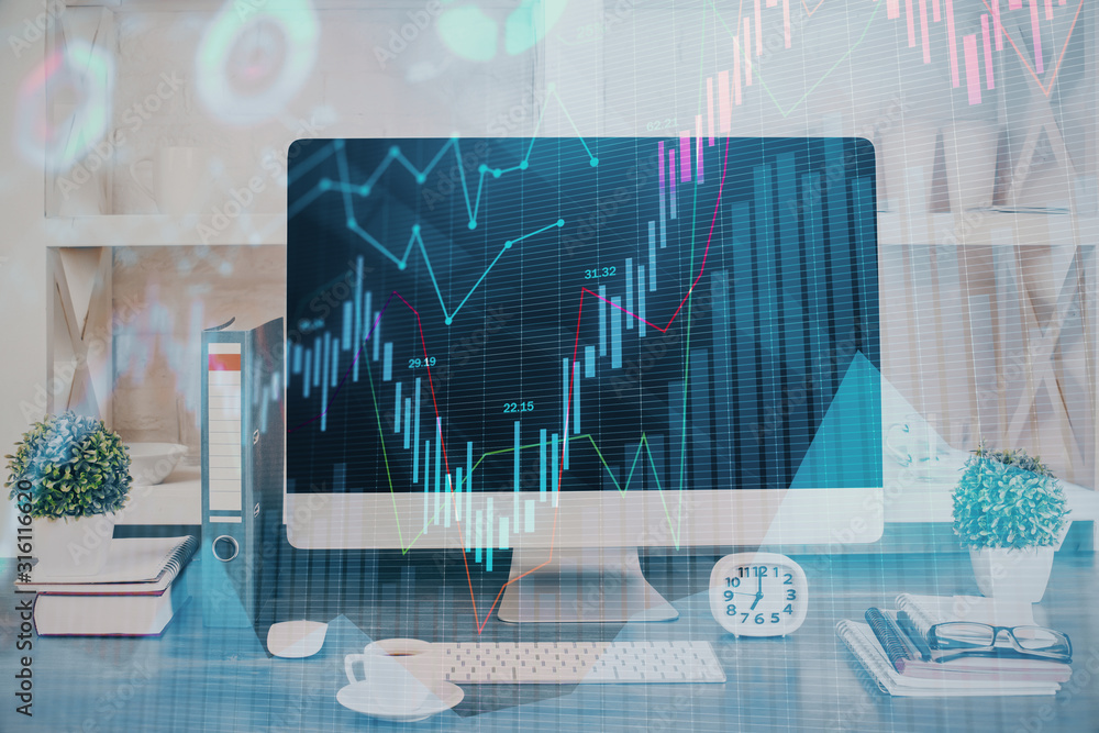 Forex graph hologram on table with computer background. Double exposure. Concept of financial markets. Forex graph hologram on table with computer background. Double exposure. Concept of financial markets.