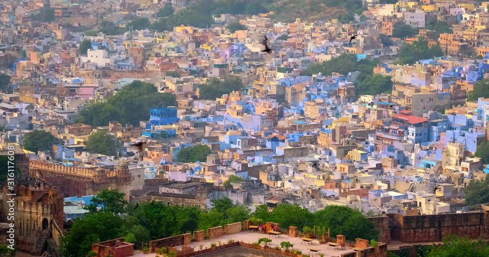 Houses and roofs of famous Jodhpur the Blue City, aerial view from Mehrangarh Fort, Rajasthan, India. Camera zoom in Houses and roofs of famous Jodhpur the Blue City, aerial view from Mehrangarh Fort, Rajasthan, India. Camera zoom in
