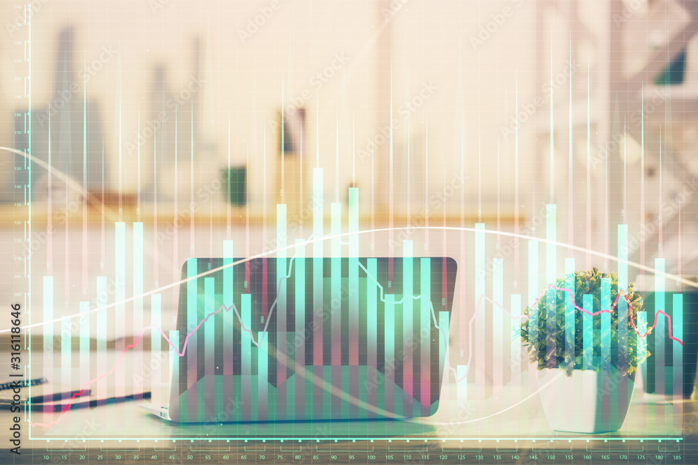 Stock market chart hologram drawn on personal computer background. Multi exposure. Concept of investment. Stock market chart hologram drawn on personal computer background. Multi exposure. Concept of investment.