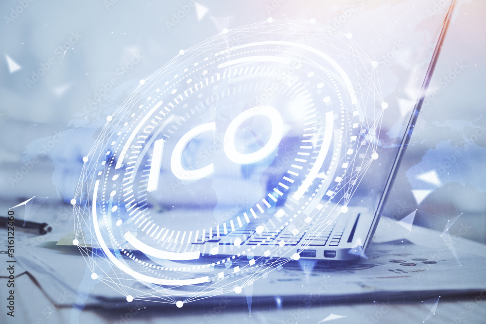 Double exposure of blockchain theme hologram and table with computer background. Concept of bitcoin crypto currency. Double exposure of blockchain theme hologram and table with computer background. Concept of bitcoin crypto currency.