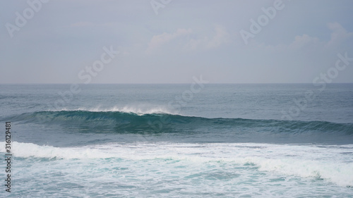 ocean waves. pipe wave in the pacific ocean. clear blue water. waves for surfing