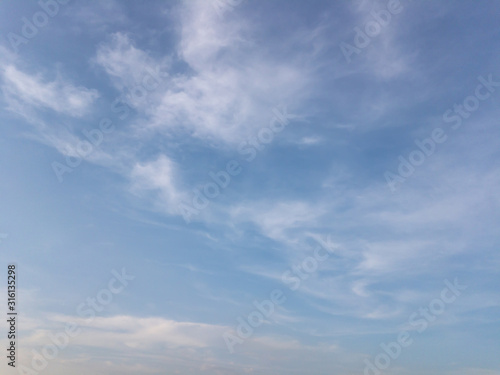 blue sky with white clouds © kwanruan