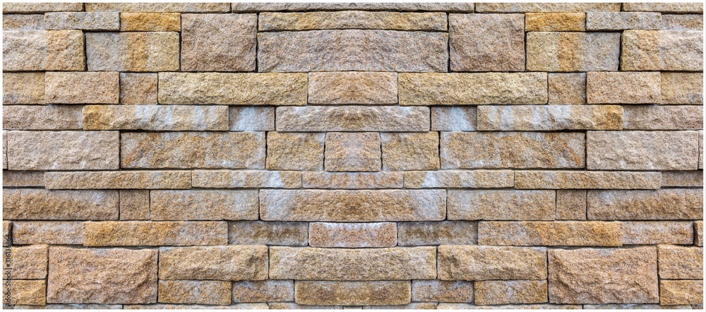 Fototapeta premium Old vintage retro style stone wall for abstract stone background and texture.