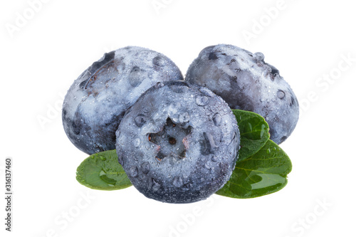Fresh blueberries with leaves.