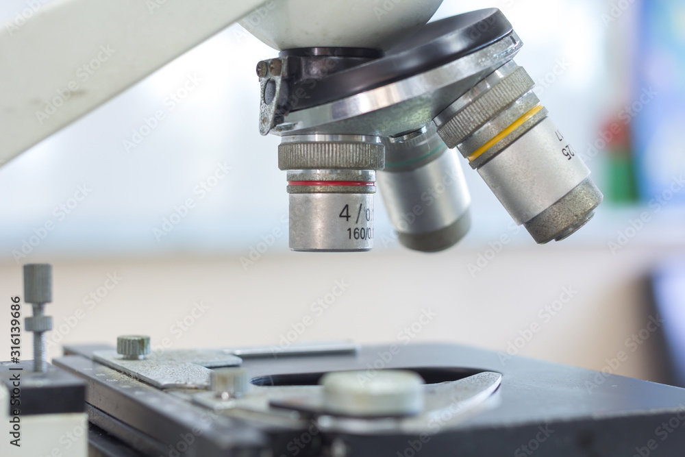 Laboratory microscope lens.modern microscopes in a lab. Laboratory microscope lens.modern microscopes in a lab.