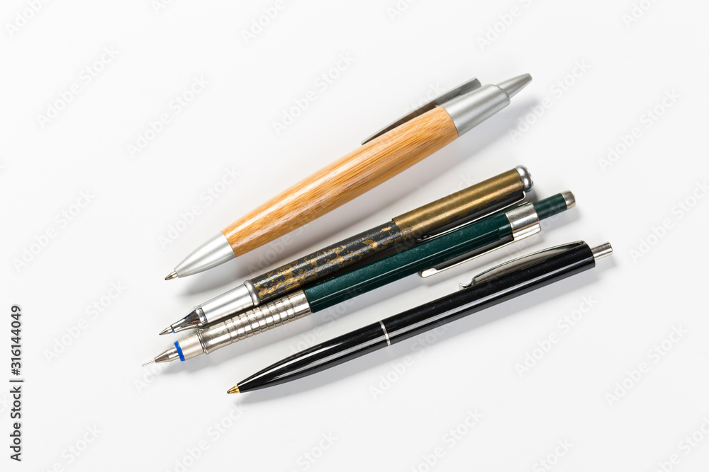 Collection of multi-colored ballpoint pens isolated on a white background Collection of multi-colored ballpoint pens isolated on a white background