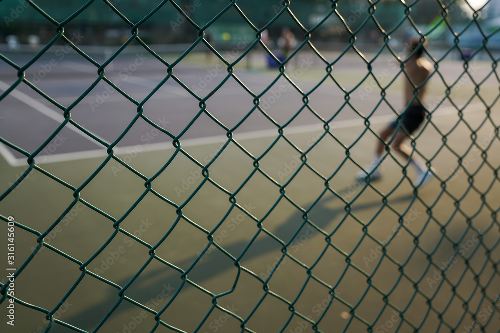 chain link fence with blue sky background chain link fence with blue sky background