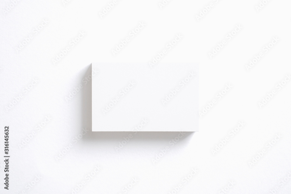 Blank business cards stack isolated on white. Mockup template for graphic designers presentations and portfolios. 3d render. Blank business cards stack isolated on white. Mockup template for graphic designers presentations and portfolios. 3d render.