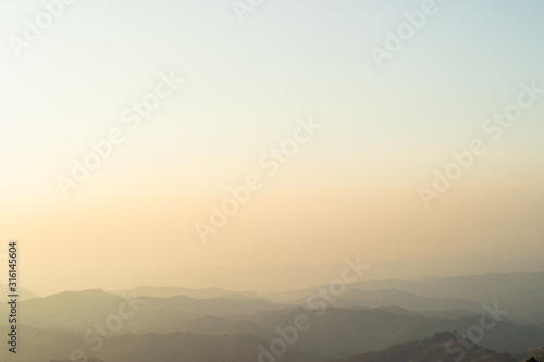 Wallpaper Mural Layers of mountain with mist and warm sunlight. Torontodigital.ca