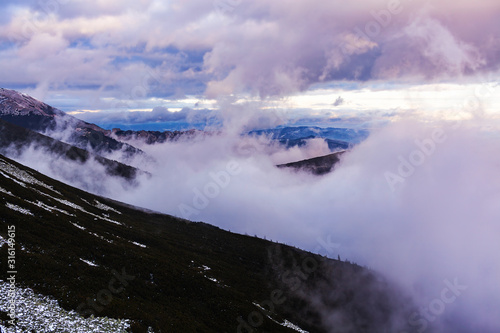 View of the High Tatras with fog and snow