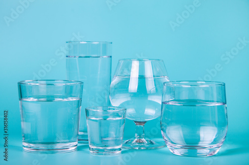 Wallpaper Mural Glasses of different shapes with water Torontodigital.ca