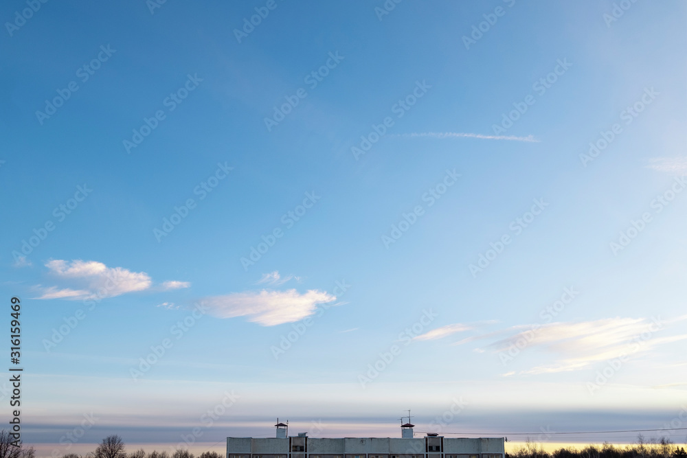 Bright blue sky with white clouds. Great background with copyspace Bright blue sky with white clouds. Great background with copyspace