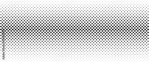 Halftone background from small black hearts.