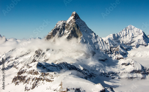 Zermatt Matterhorn and glacier view mountain winter snow landscape clouds