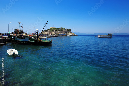The harbour of Kusadasi, Turkey. Pigeon Island in the background.