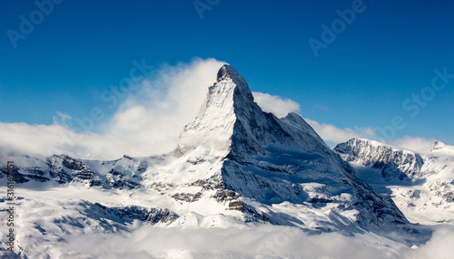 Zermatt Matterhorn and glacier view mountain winter snow landscape clouds