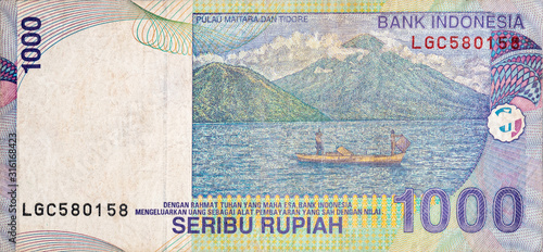 Pulau Maitara Dan Tidore on Indonesia 1000 rupiah bank note, former currency of Indonesia photo