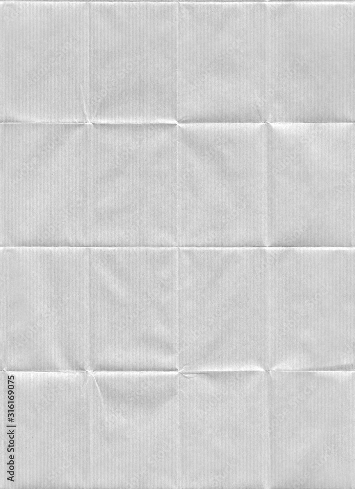 Folded white Kraft paper texture. Seamless pattern with a folded and