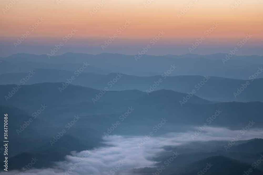 Beautiful landscape of the mountains in the morning with fog and sunrise in the winter at Doi Samer Dao, Nan, Thailand. Beautiful landscape of the mountains in the morning with fog and sunrise in the winter at Doi Samer Dao, Nan, Thailand.