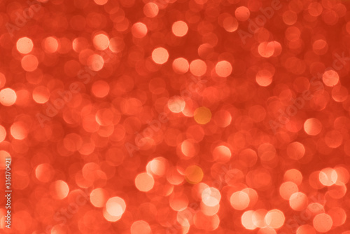 Red abstract background with bokeh defocused lights