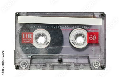 Photo Transparent audio cassette tape isolated on white