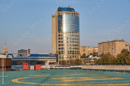 Moscow, Russia - September 12, 2019: view from the Presnenskaya embankment to the Bagration business center. Helipad near the Moscow River