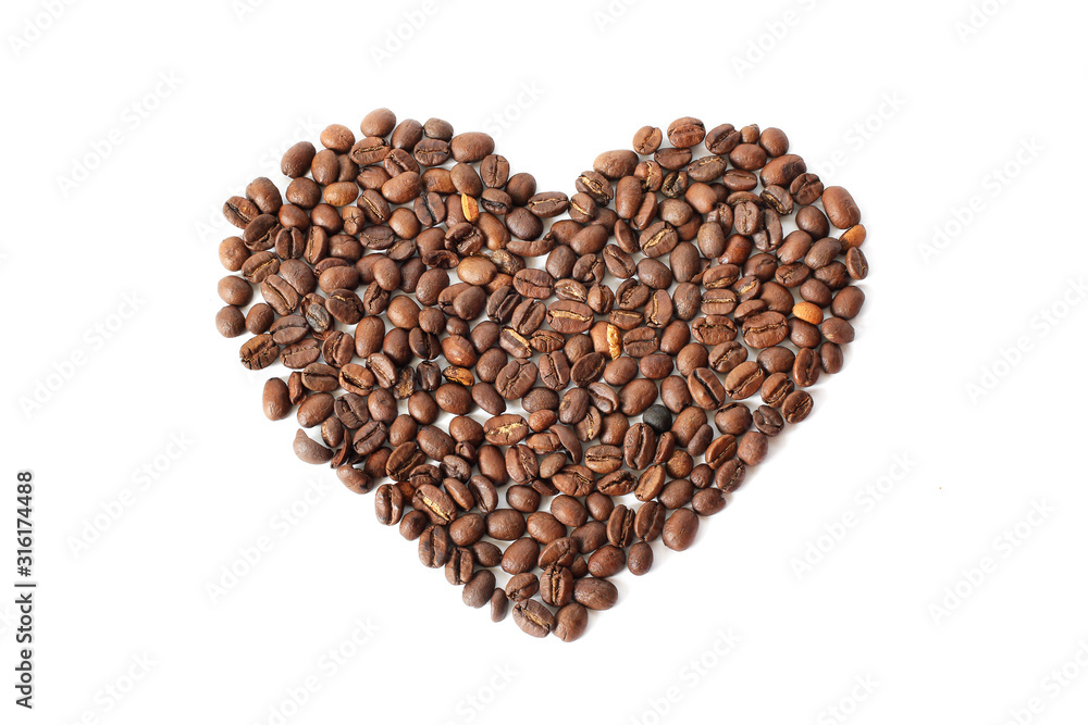Coffee beans. Heart made from coffee beans on a white background. brown Coffee beans. Heart made from coffee beans on a white background. brown