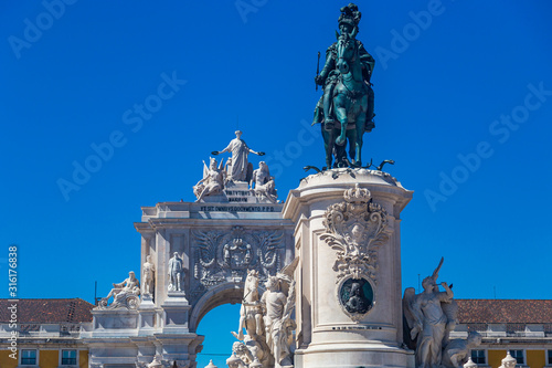 The equestrian statue of Joseph 1st of Portugal, bronze made by Joaquim Machado de Castro in 1775 and the Arch of Triumph on the Commerce square in Lisbon