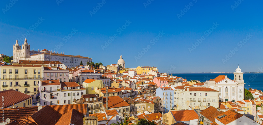 Panoramic view of Lisbon from the terrace from the Portas Do Sol belvedere in the Alfama district in Lisbon, Portugal