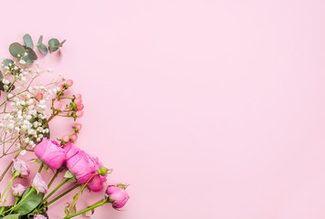 Flowers on pink background with copy space