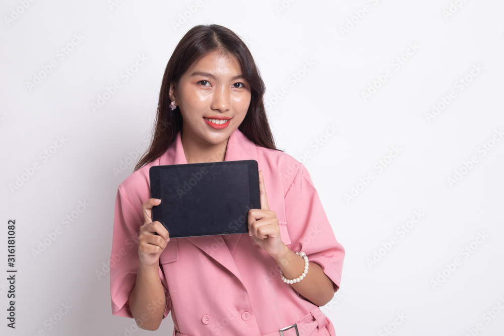 Young Asian woman with a computer tablet. Young Asian woman with a computer tablet.