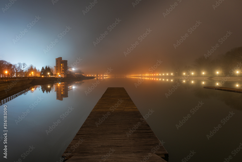 Winter misty night over rowing channel in Plovdiv city, Bulgaria