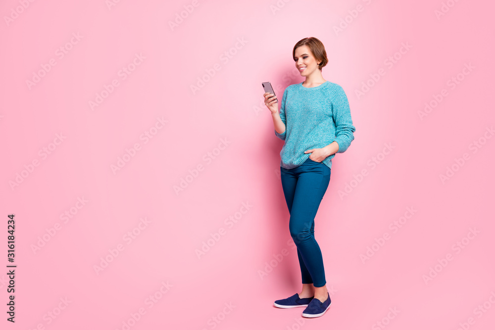 Full length body size view of her she nice attractive pretty lovely cheerful brown-haired girl using cell chatting with boyfriend date web service isolated over pink pastel color background Full length body size view of her she nice attractive pretty lovely cheerful brown-haired girl using cell chatting with boyfriend date web service isolated over pink pastel color background