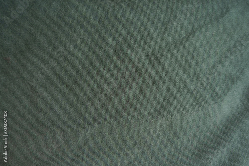 Simple dark green viscose and polyester fabric from above